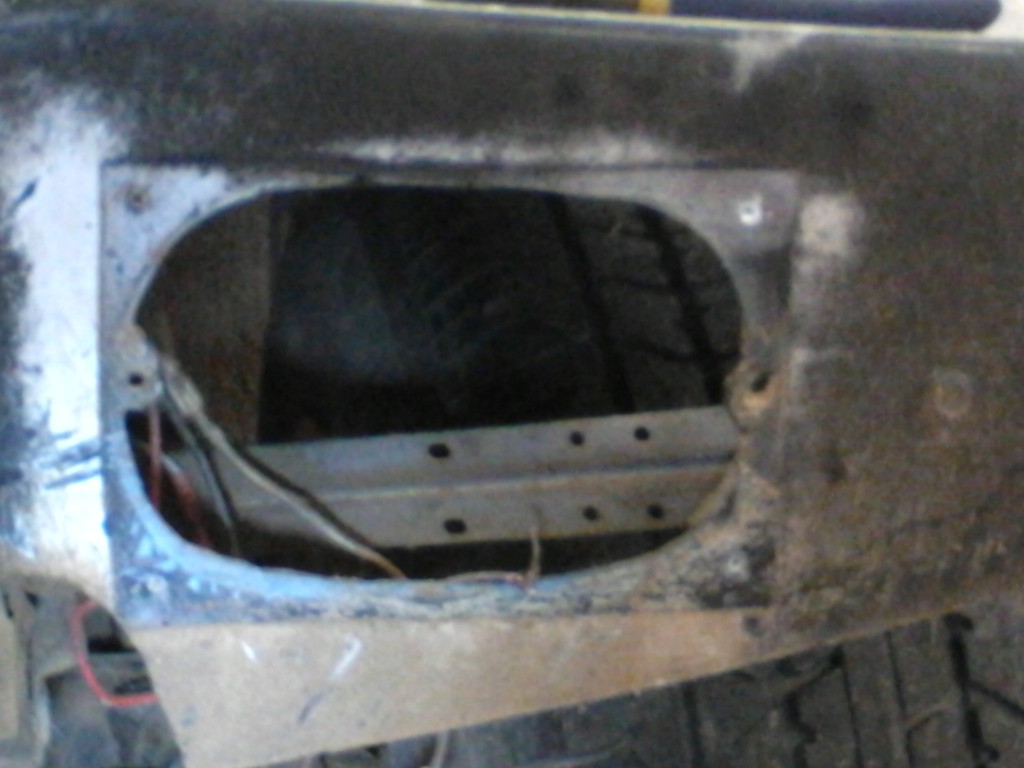 Hole in rear fender.